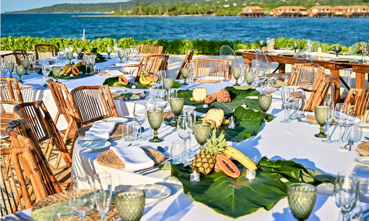 Banquet tables with tropical decorations