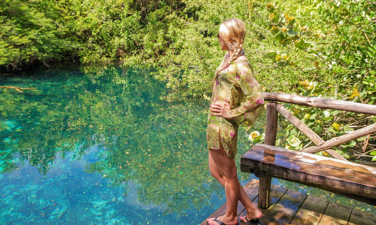 A woman visiting the Ojos Indígenas Ecological Reserve