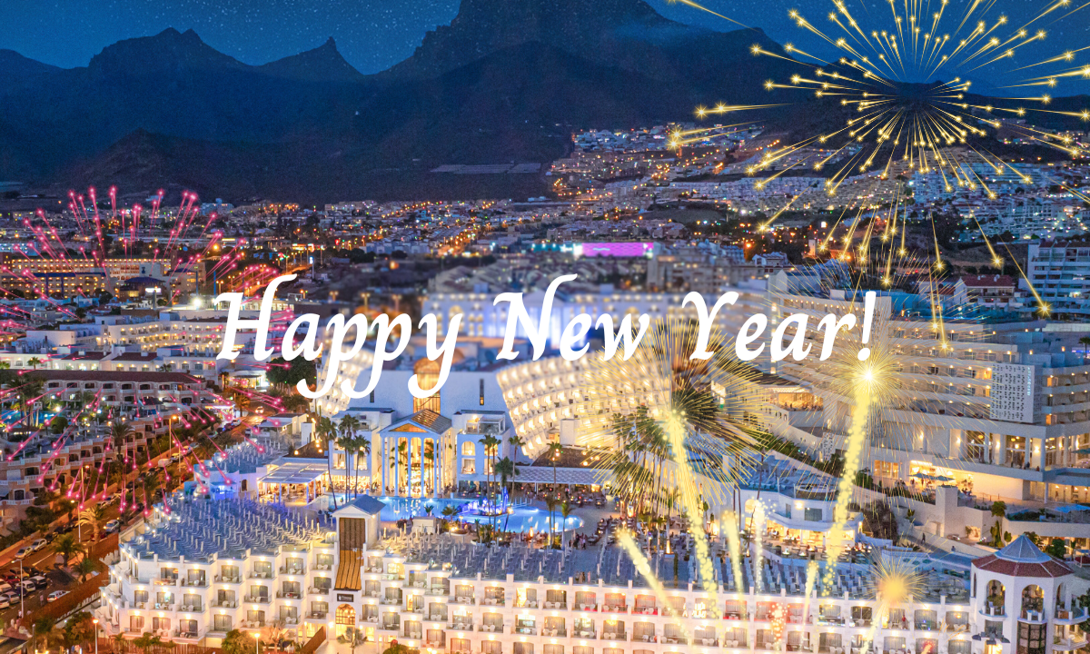 Fireworks over Tenerife with the text “Happy New Year!”