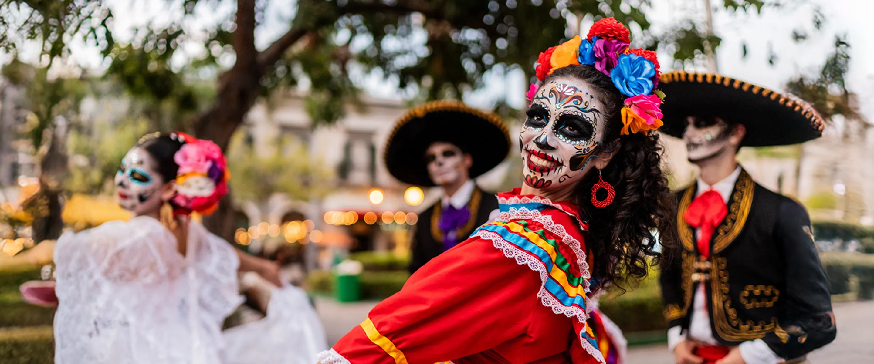 Catrinas dancing with mariachis