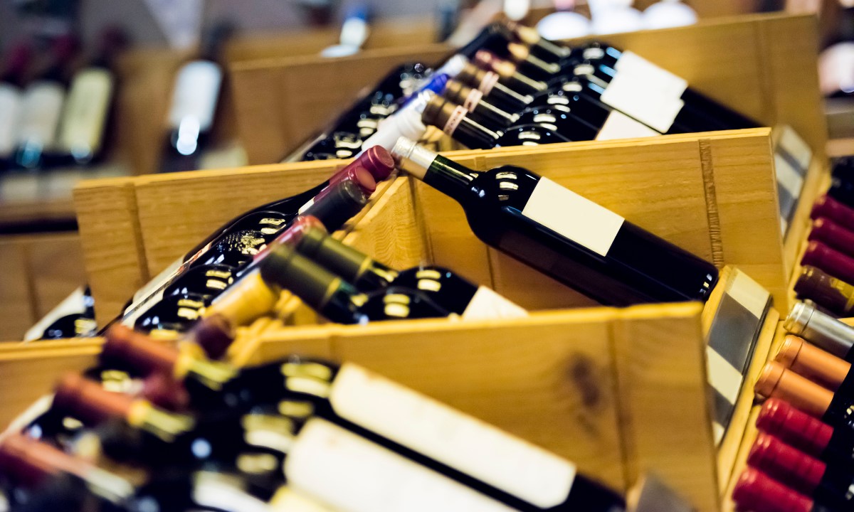 Bottles of wine in wooden boxes in a shop in Tenerife