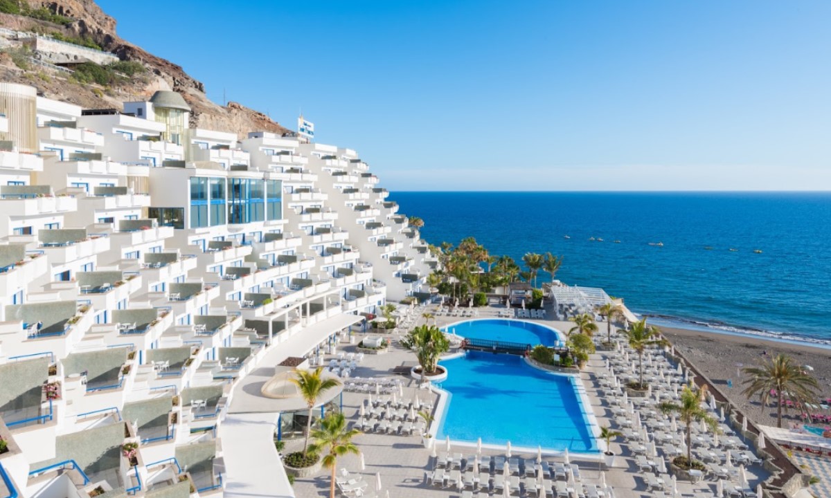 TUI BLUE Suite Princess adults-only hotel complex next to the beach and outdoor swimming pools.