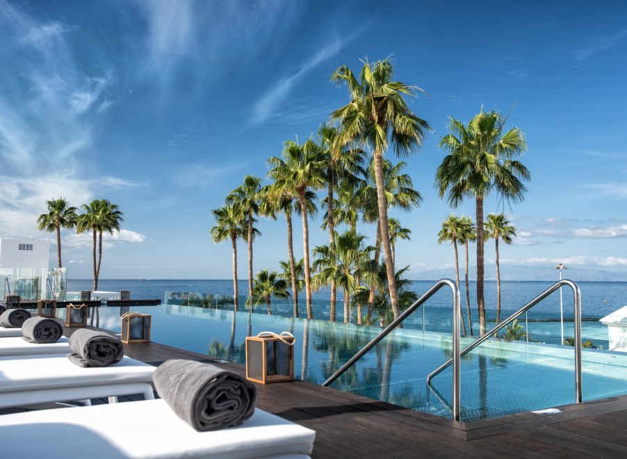 Swimming pool area of the Guayarmina Princess hotel in Tenerife